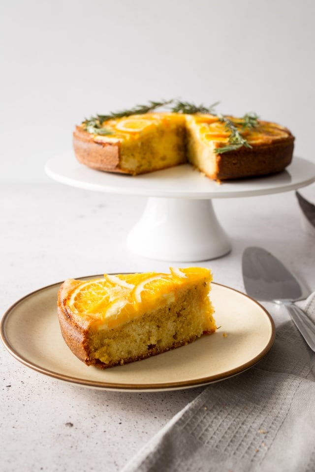 Orange and Rosemary marry in this light, orange upside down cake. Moist, delicate and not too sweet, a slice of this cake is perfect for your afternoon tea or coffee!