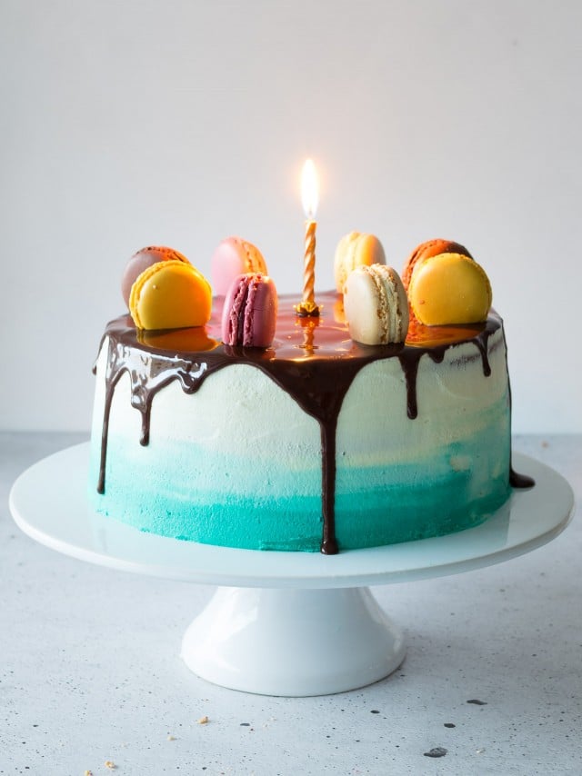 A deliciously moist Vanilla layer cake filled with vanilla buttercream frosting and topped with a rich chocolate ganache. This is a centre piece cake you just can't ignore