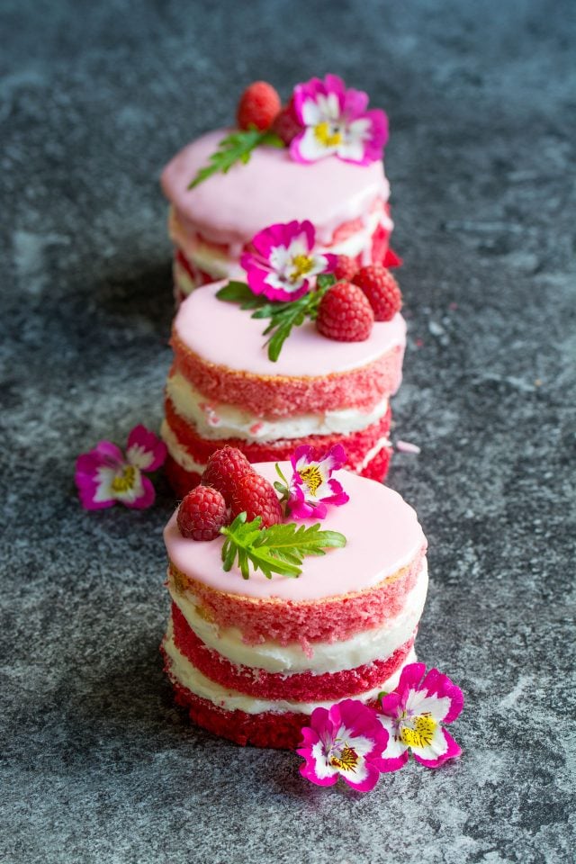 How cute are these ombre rhubarb mini cakes?! Sandwiched together with fresh rhubarb compote and creamy buttercream, you're going to love them!