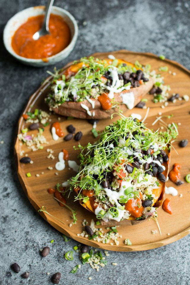 Loaded Sweet Potatoes with Quinoa Tabbouleh. Healthy and totally vegan, these baked sweet potatoes are topped with fresh, vibrant ingredients for a great, satisfying meal!