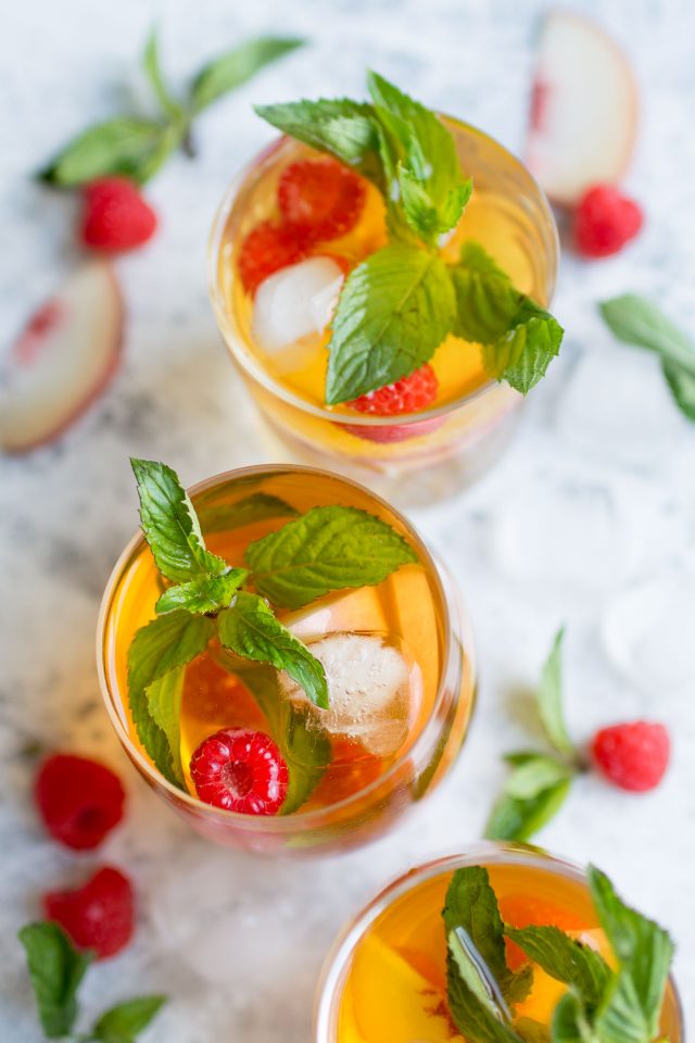 Homemade Peach Ice Tea. Simple and absolutely perfect for the summertime, this cooling drink will leave you feeling refreshed and rejuvenated!