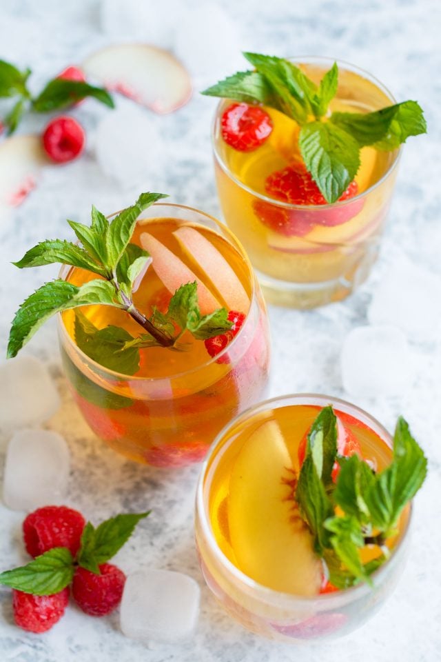 Homemade Peach Ice Tea. Simple and absolutely perfect for the summertime, this cooling drink will leave you feeling refreshed and rejuvenated!