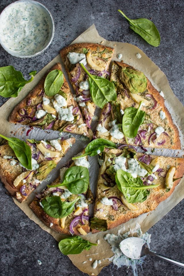 Vegan ranch pizza. This wholewheat base is topped with the creamiest vegan ranch sauce and topped with lots of great vegetables for a fun alternative to the regular tomato base.