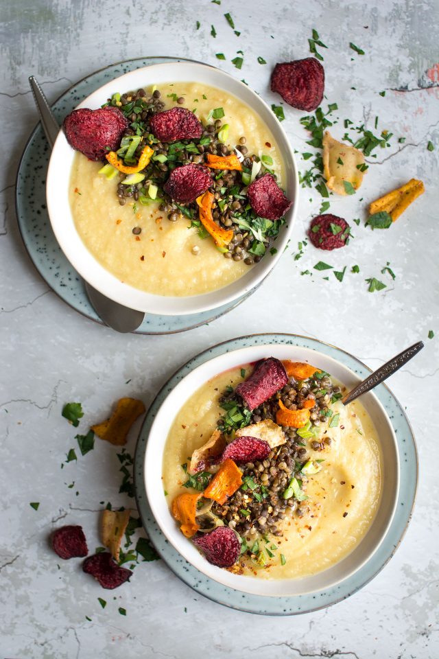 A delicious, sweet parsnip and apple soup, loaded with lentils and roasted vegetable crisps