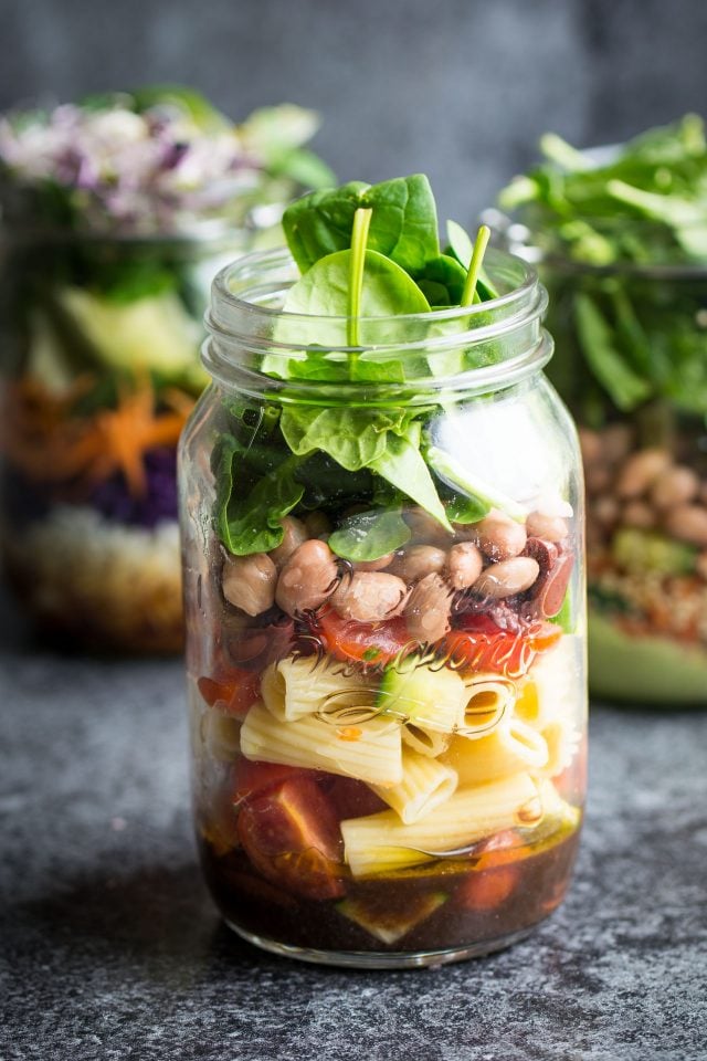 Quick, easy, on the go vegan salad jars are perfect for preparing ahead and grabbing on your way to work or school!